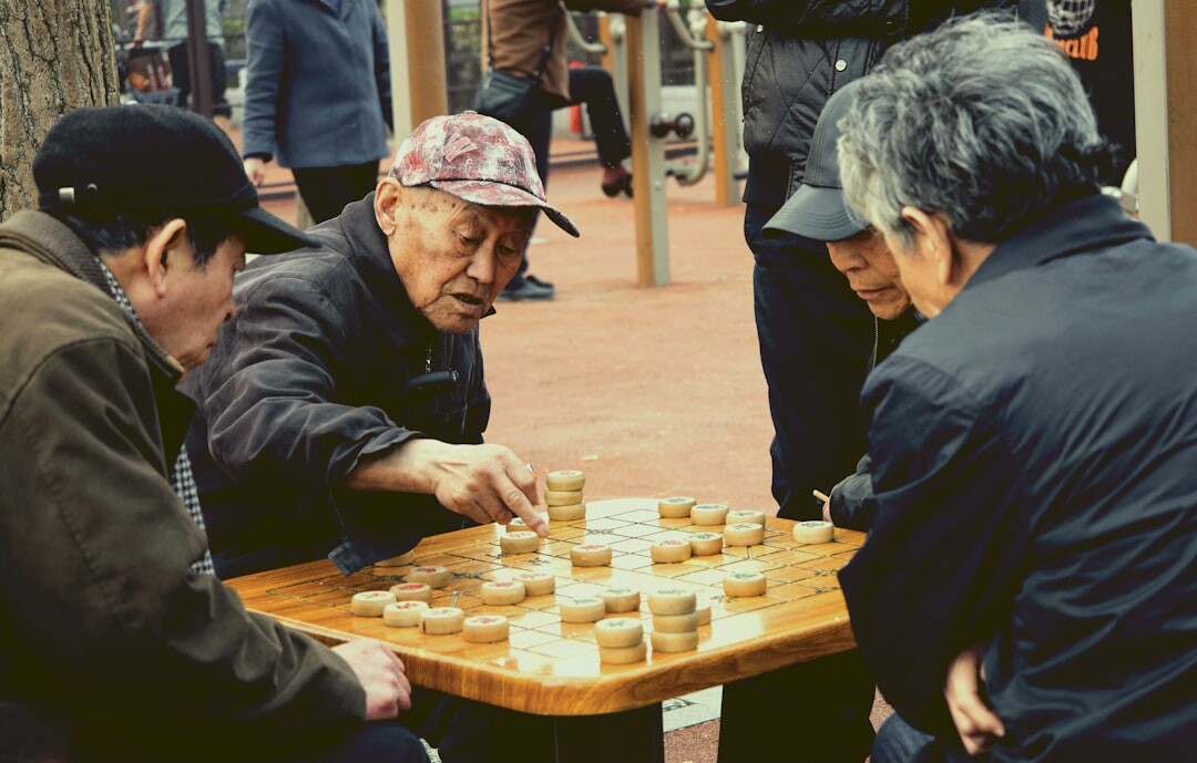 group of seniors playing board games
