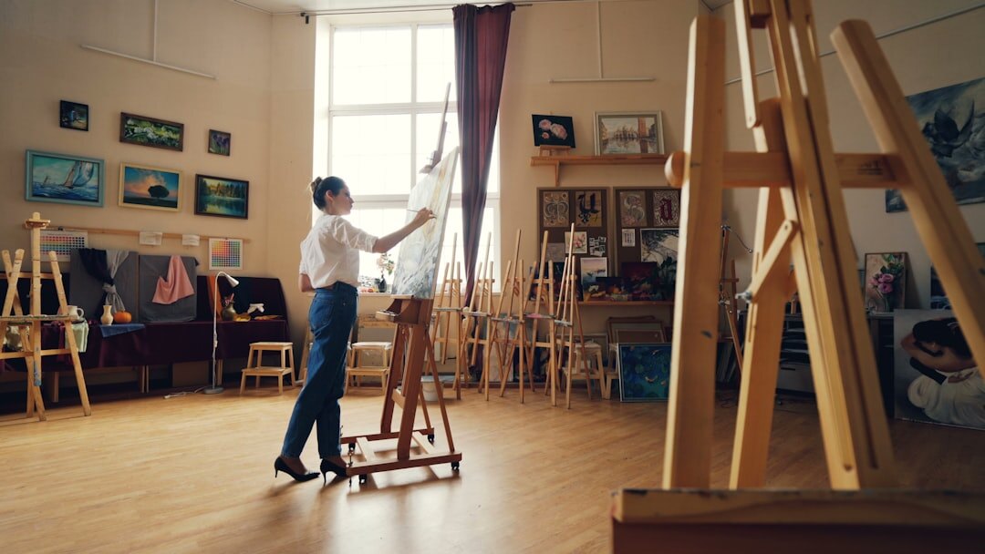 seniors painting in workshop